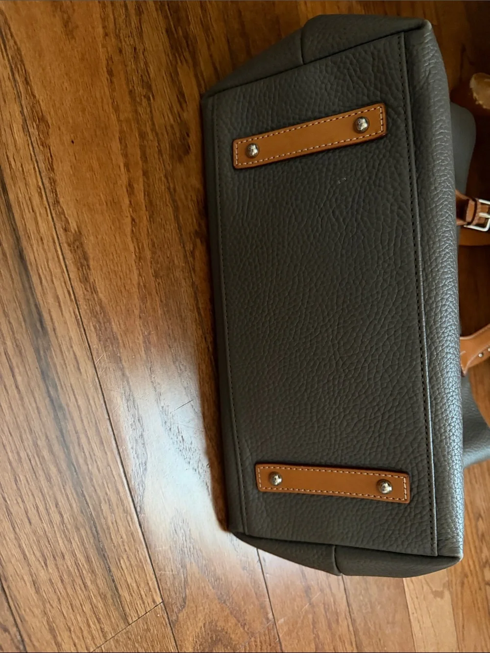 Dooney & Bourke Tote with Tan Leather Straps and Grommet Details